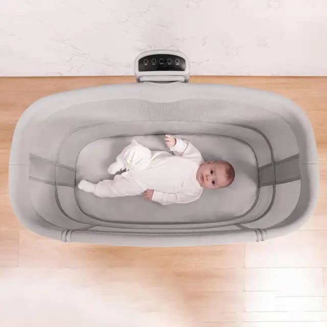 Mastela lẹgbẹẹ iya bassinet