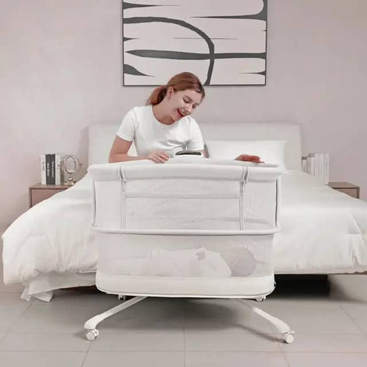 Mastela lẹgbẹẹ iya bassinet