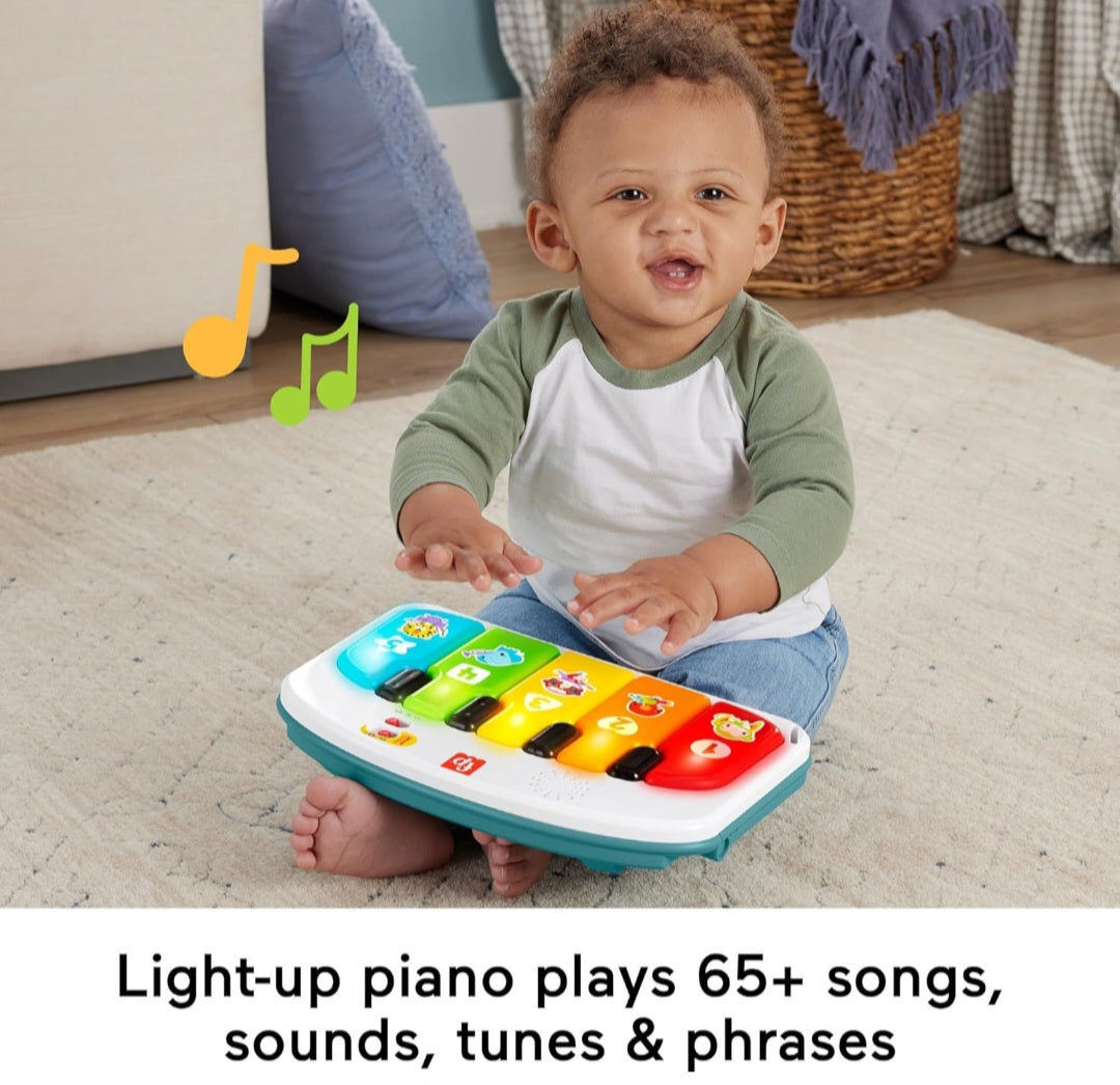 Ilẹ ọmọde joko pẹlu atẹ yiyọ kuro ati ibi-idaraya piano